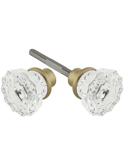 Pair of Fluted Crystal Door Knobs With Solid Brass Base in Antique Brass.